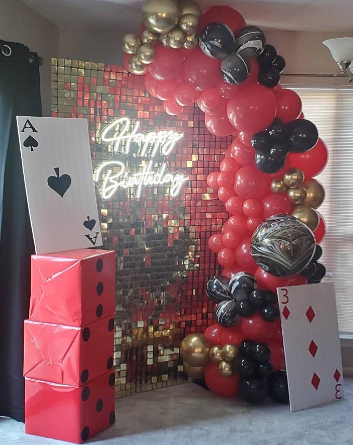 red and black balloon garland